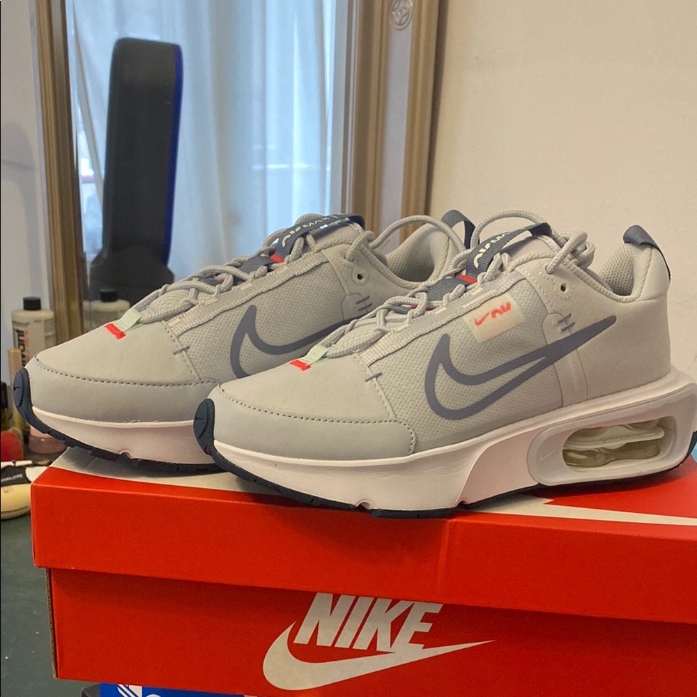 Nike Air Gray Sneakers with Blue Swoosh